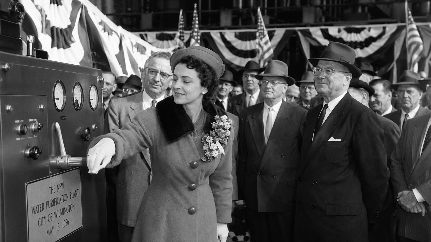 A 1956 ceremony opening Calder Hall, with a dignitary pulling a lever before a crowd