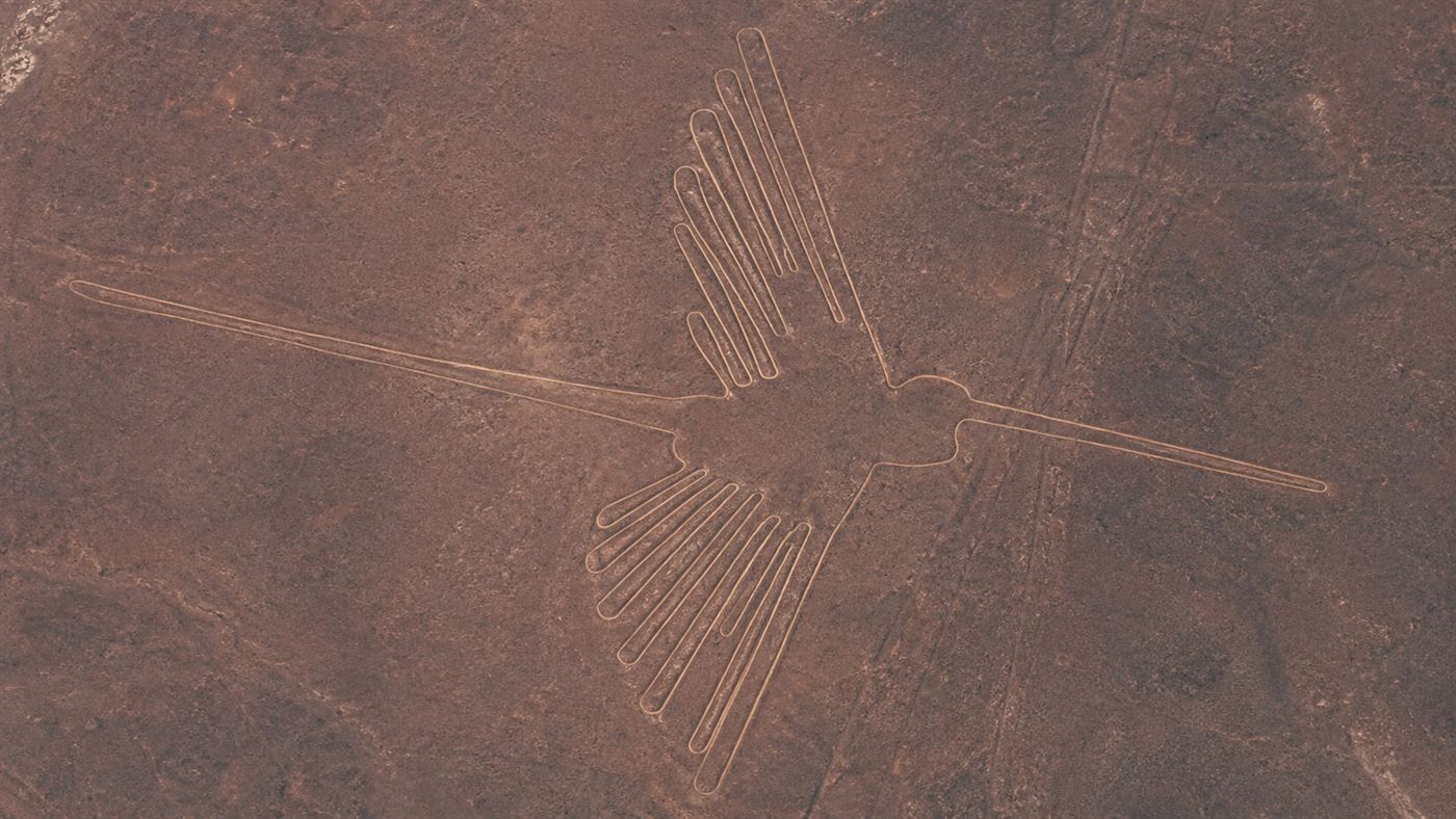 An aerial view of the giant hummingbird geoglyph, one of the famous Nazca Lines