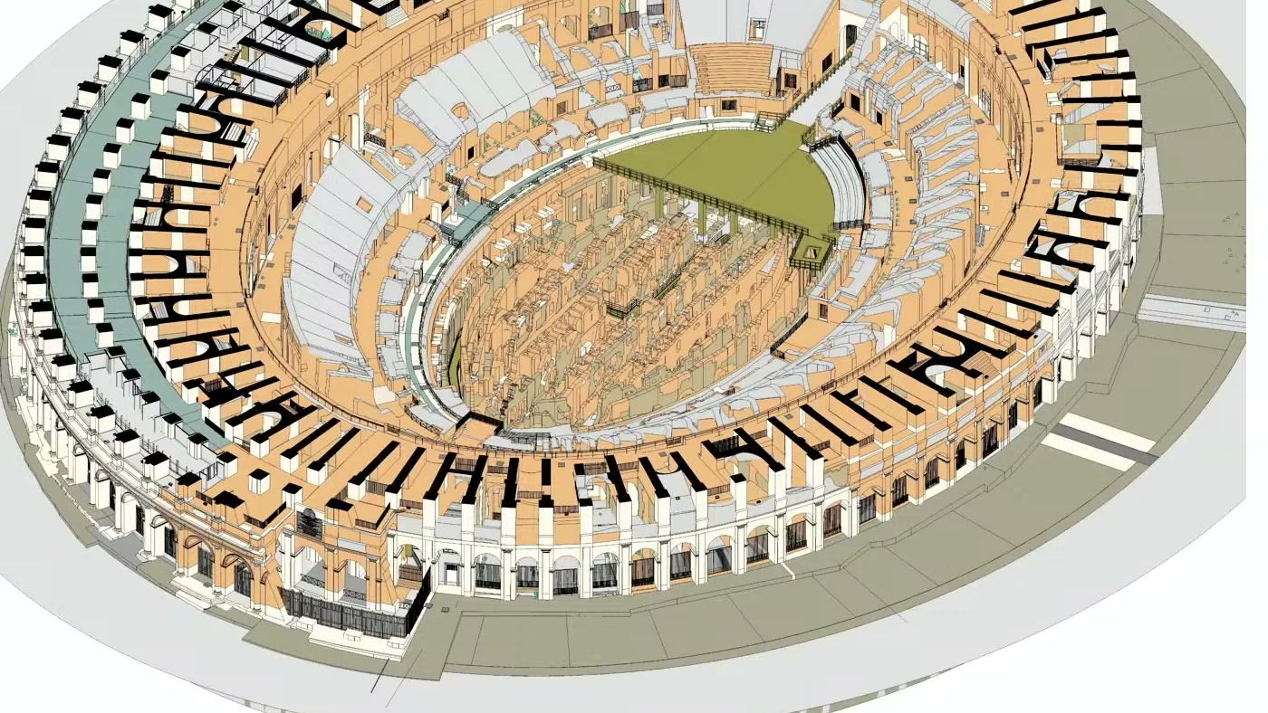 Modelo digital HBIM do Coliseu visto de cima, com as paredes e arcos em bege e branco, as arquibancadas em cinza e a arena parcialmente coberta em verde