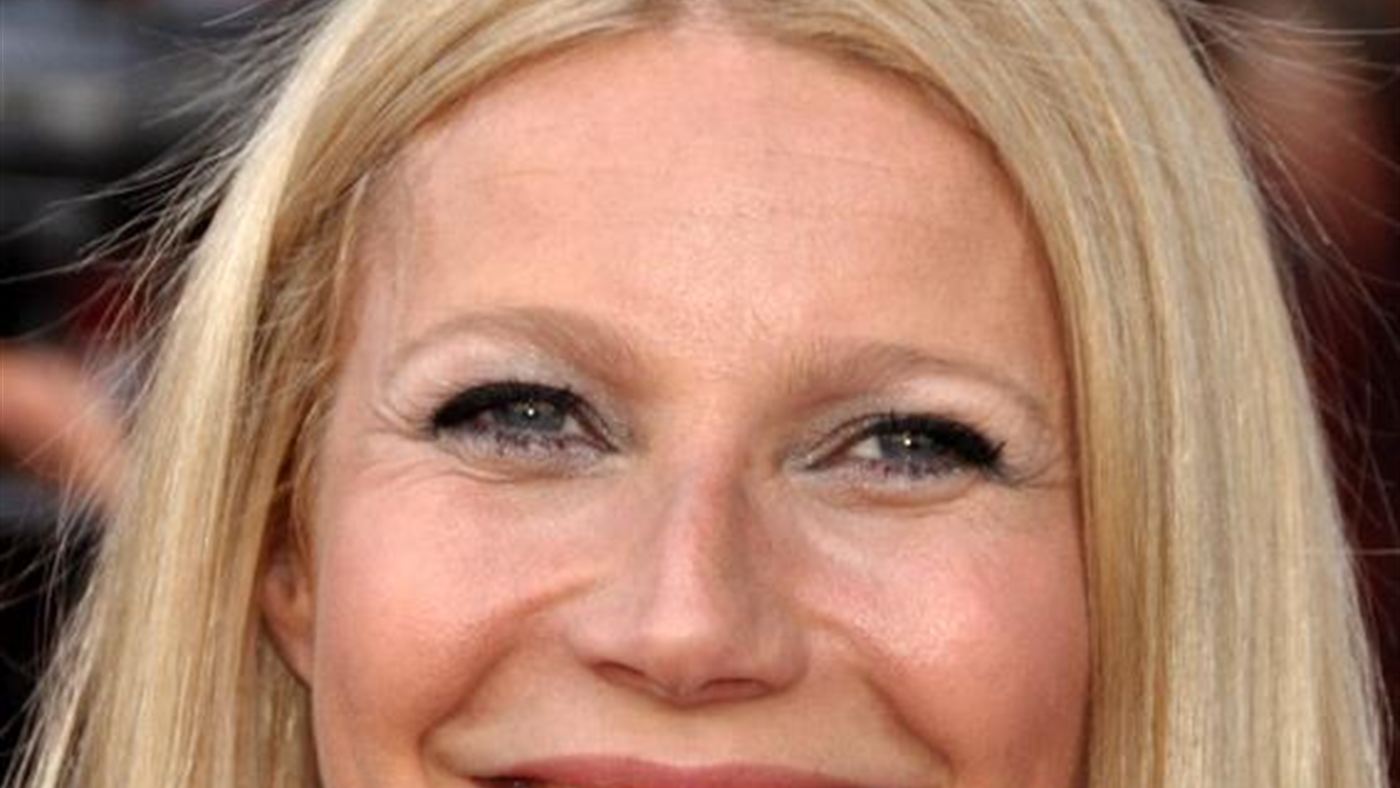 Gwyneth Paltrow em tapete vermelho antes do divórcio de Chris Martin